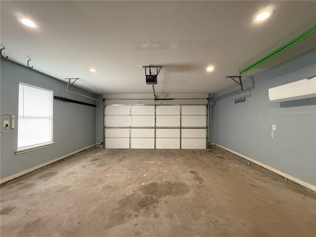 70281 7th St, Covington, LA 70433 - garage with a garage door opener and baseboards