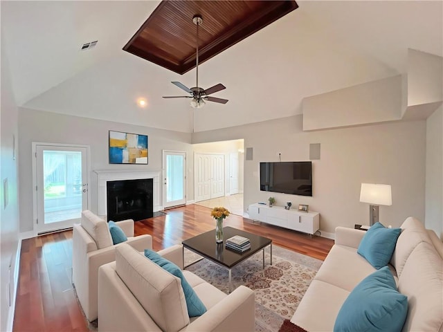 4026 Platt St, Kenner, LA 70065 - living area with wood finished floors, vaulted ceiling, a ceiling fan, and wooden ceiling
