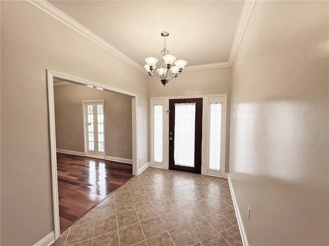 4026 Platt St, Kenner, LA 70065 - foyer featuring crown molding, a chandelier, and tile patterned flooring