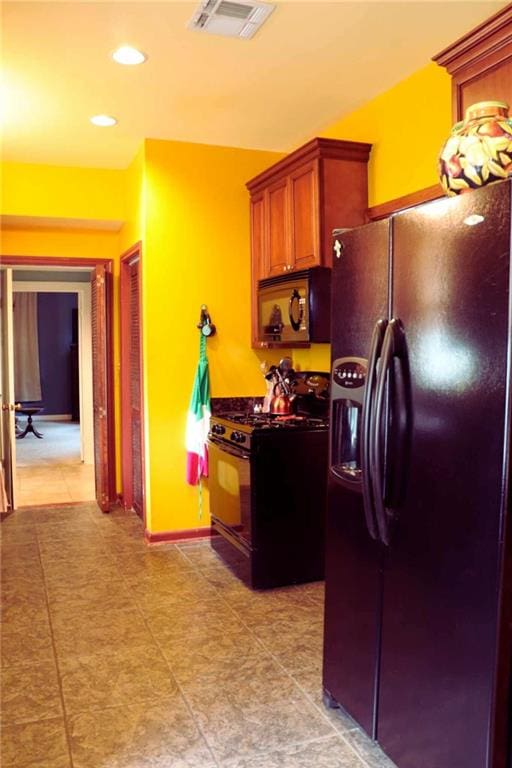 3612 Johnson St, Metairie, LA 70001 - kitchen with black appliances, dark countertops, recessed lighting, and baseboards