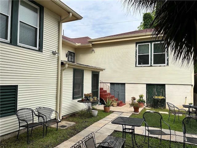 3612 Johnson St, Metairie, LA 70001 - rear view of house with a patio area