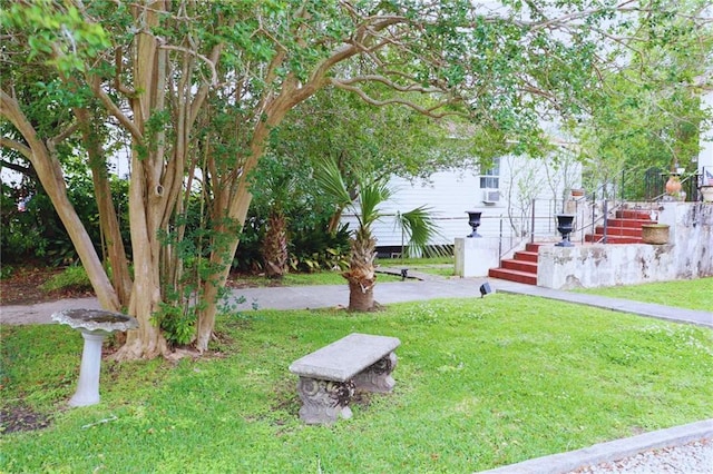 3612 Johnson St, Metairie, LA 70001 - surrounding community featuring a lawn and stairs