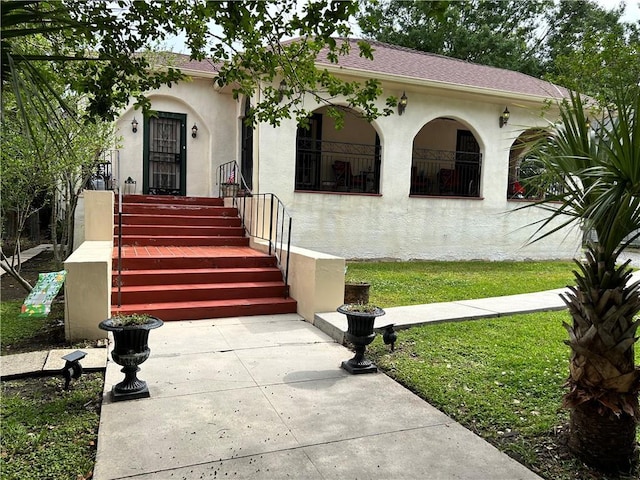 3612 Johnson St, Metairie, LA 70001 - mediterranean / spanish-style house featuring stucco siding