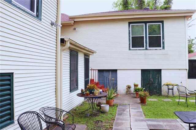 3612 Johnson St, Metairie, LA 70001 - back of house featuring a yard
