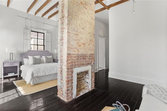 1035 Arabella St, New Orleans, LA 70115 - bedroom with hardwood / wood-style flooring, baseboards, and beamed ceiling