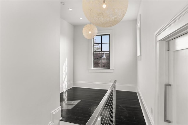 1035 Arabella St, New Orleans, LA 70115 - stairs featuring wood finished floors, baseboards, and recessed lighting