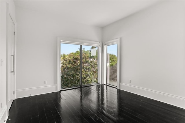 1035 Arabella St, New Orleans, LA 70115 - unfurnished room with baseboards and wood finished floors