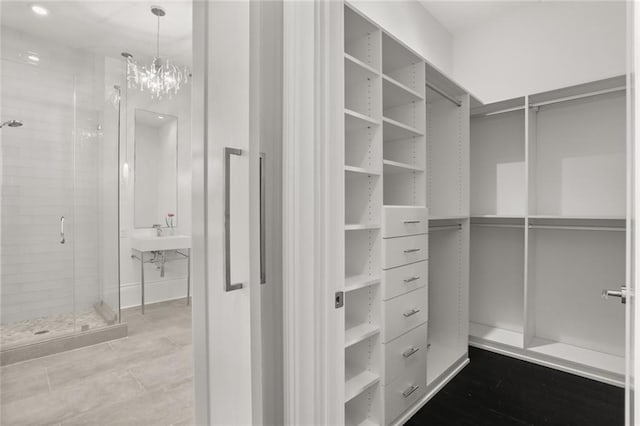 1035 Arabella St, New Orleans, LA 70115 - spacious closet with a chandelier