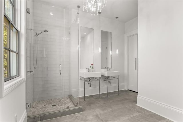 1035 Arabella St, New Orleans, LA 70115 - bathroom with baseboards, a stall shower, and vanity