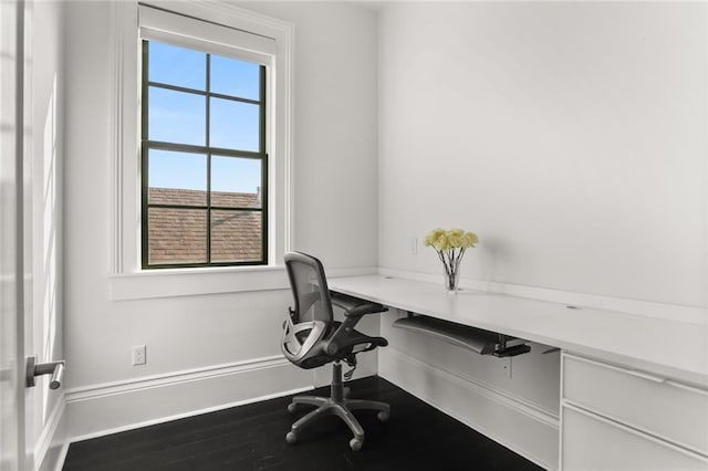 1035 Arabella St, New Orleans, LA 70115 - office area featuring baseboards and wood finished floors