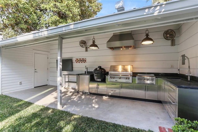 1035 Arabella St, New Orleans, LA 70115 - view of patio / terrace with grilling area, a sink, and area for grilling