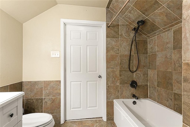 2106 Swan St, Slidell, LA 70460 - bathroom with tile walls, toilet, shower / bath combination, vanity, and a wainscoted wall
