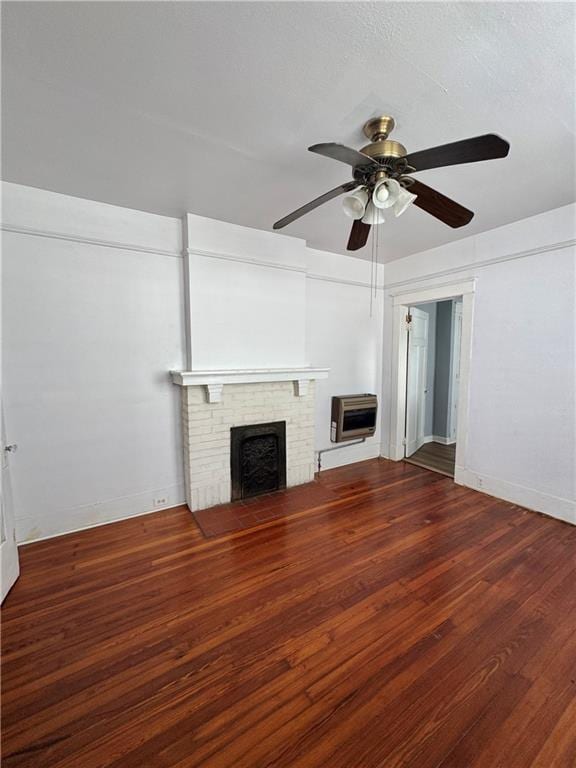 770002 Spruce St, New Orleans, LA 70118 - unfurnished living room with a brick fireplace, baseboards, ceiling fan, heating unit, and wood-type flooring
