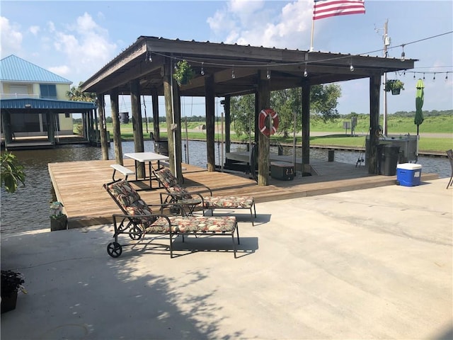 view of property's community with a boat dock and a water view