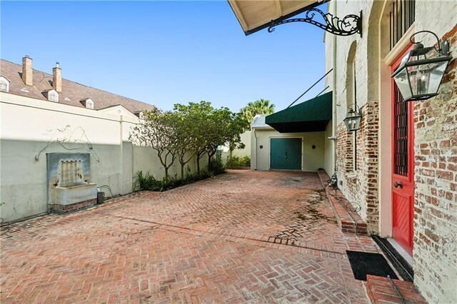 515 Ursulines Ave, New Orleans, LA 70116 - view of patio with fence