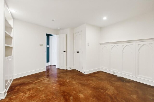 515 Ursulines Ave, New Orleans, LA 70116 - spare room featuring concrete flooring and recessed lighting