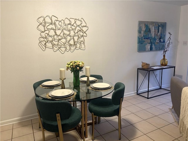 2626 Lepage St, New Orleans, LA 70119 - dining room with light tile patterned floors and baseboards