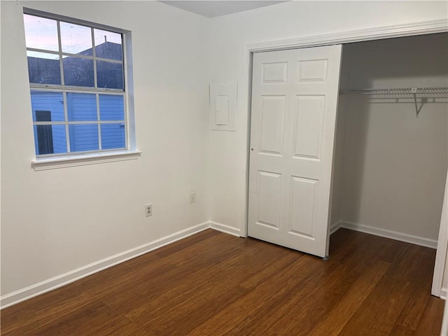 2626 Lepage St, New Orleans, LA 70119 - unfurnished bedroom featuring dark wood-type flooring and a closet