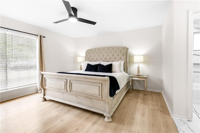 146 Bluefield Dr, Slidell, LA 70458 - bedroom featuring baseboards, a ceiling fan, and light wood-style floors