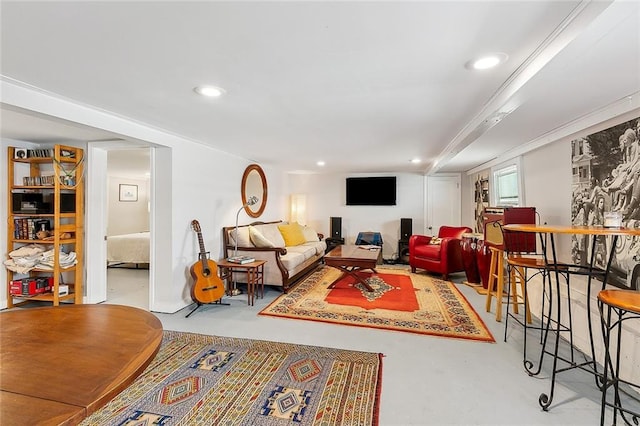 living area featuring recessed lighting and concrete flooring