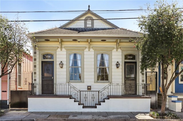 2224 N Rampart St, New Orleans, LA 70116 - view of front of house featuring roof with shingles