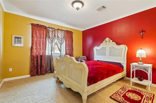 3605 W Grandlake Blvd, Kenner, LA 70065 - bedroom featuring visible vents, baseboards, a textured ceiling, crown molding, and carpet flooring