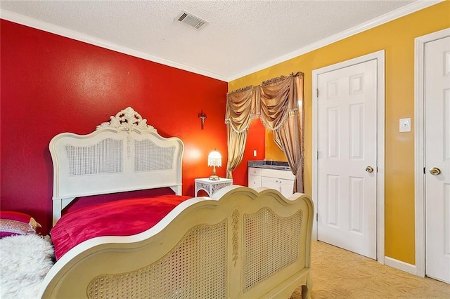3605 W Grandlake Blvd, Kenner, LA 70065 - bedroom with visible vents, a textured ceiling, crown molding, and carpet floors