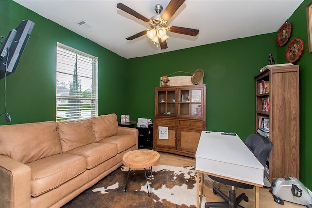 201 Belle Pointe Dr, Madisonville, LA 70447 - home office featuring a ceiling fan and wood finished floors