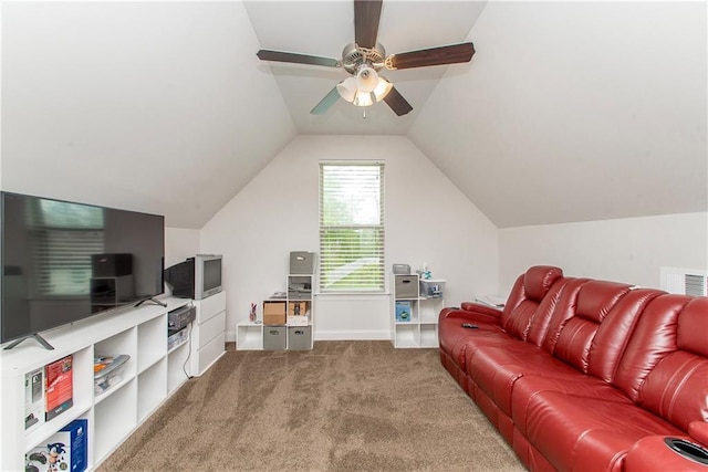 201 Belle Pointe Dr, Madisonville, LA 70447 - carpeted living area featuring a ceiling fan, vaulted ceiling, and baseboards