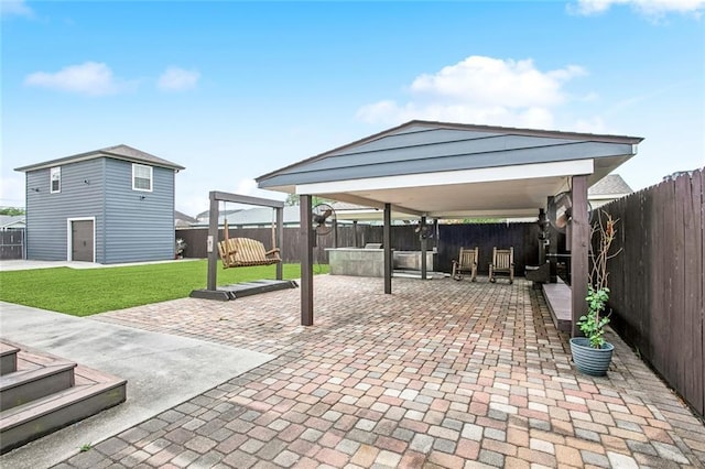 view of patio / terrace featuring a gazebo and a fenced backyard