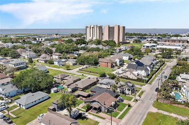 aerial view featuring a residential view and a water view