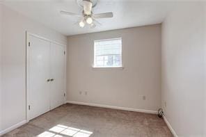 5004-0606 Newlands St, Metairie, LA 70006 - unfurnished bedroom with carpet flooring, a closet, baseboards, and ceiling fan
