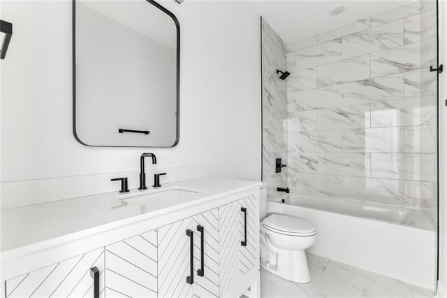 2825-27 Spain St, New Orleans, LA 70122 - full bathroom featuring toilet, marble finish floor, vanity, and  shower combination