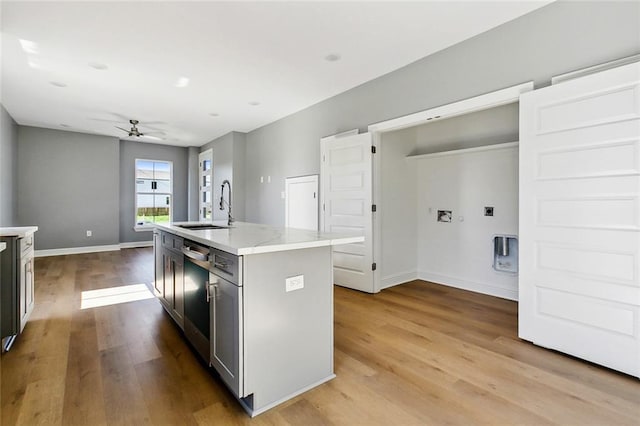 3501-03 Hamburg St, New Orleans, LA 70122 - unfurnished bedroom with wood finished floors, a closet, baseboards, and a ceiling fan