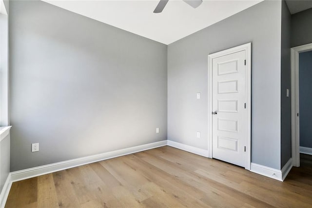 3501-03 Hamburg St, New Orleans, LA 70122 - kitchen featuring appliances with stainless steel finishes, gray cabinetry, baseboards, and light wood-style floors