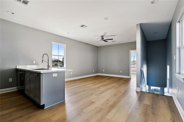3501-03 Hamburg St, New Orleans, LA 70122 - unfurnished bedroom featuring light wood-style floors, baseboards, and a walk in closet