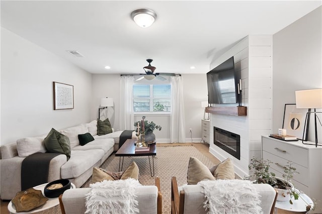 7800 Allison Rd, New Orleans, LA 70126 - living room with visible vents, baseboards, ceiling fan, a fireplace, and recessed lighting