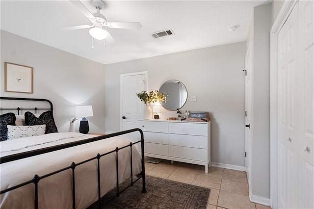 7800 Allison Rd, New Orleans, LA 70126 - bedroom featuring ceiling fan, light tile patterned floors, baseboards, and visible vents