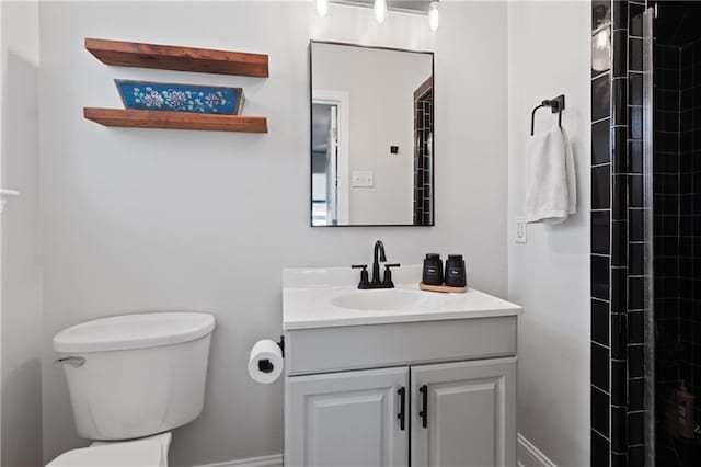 7800 Allison Rd, New Orleans, LA 70126 - full bath featuring a tile shower, toilet, and vanity