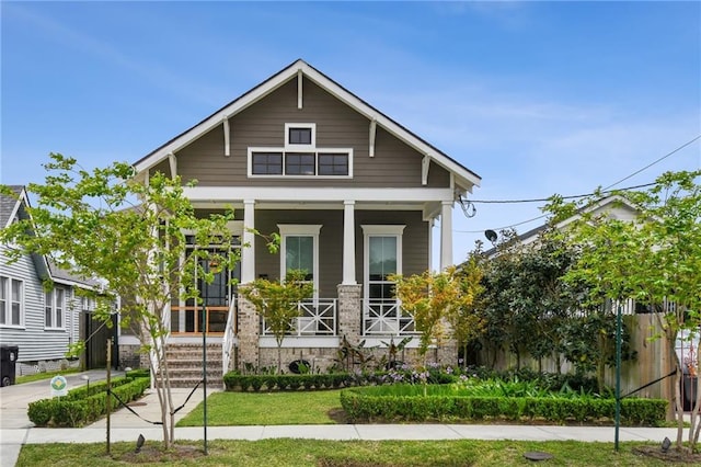5321 Venus St, New Orleans, LA 70122 - view of front of home with a porch