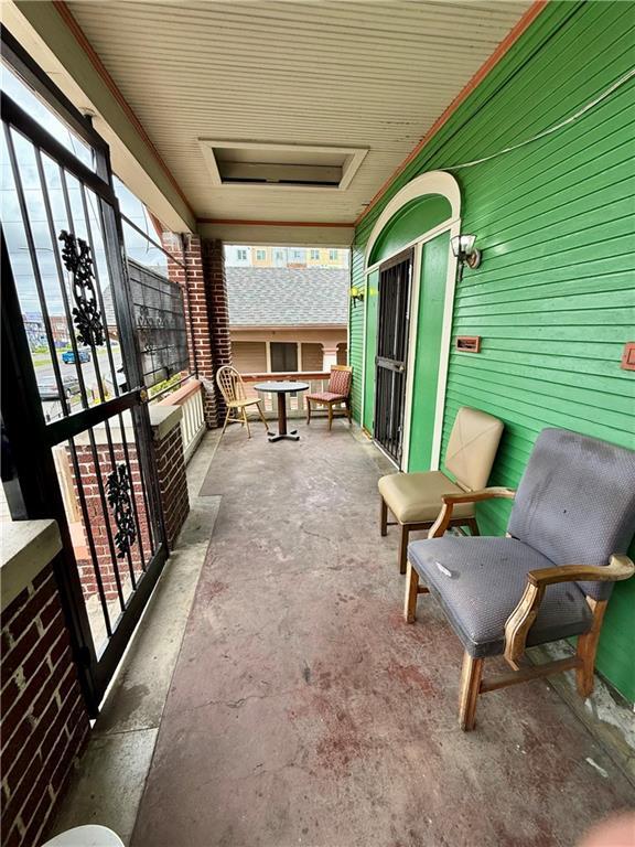 351517 Tulane Ave, New Orleans, LA 70119 - view of patio / terrace with a balcony