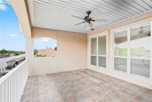 view of patio featuring ceiling fan