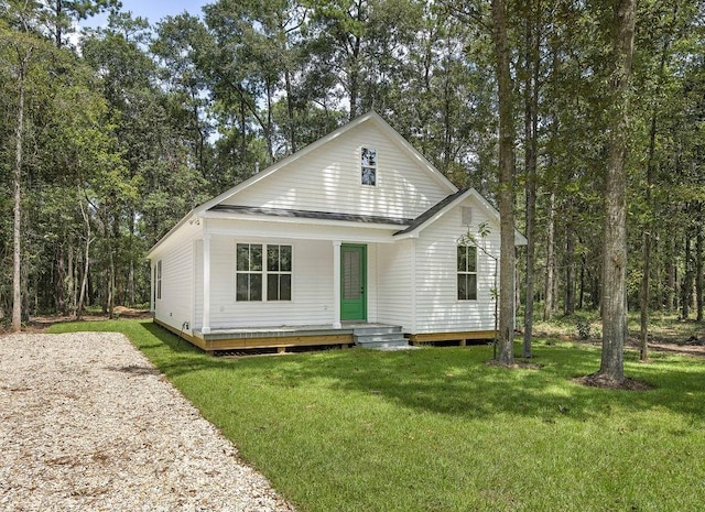 1128 W 19th Ave, Covington, LA 70433 - view of front facade with a front yard and a porch