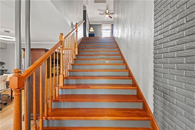 800 Marguerite Rd, Metairie, LA 70003 - stairway with a ceiling fan, ornamental molding, and wood finished floors