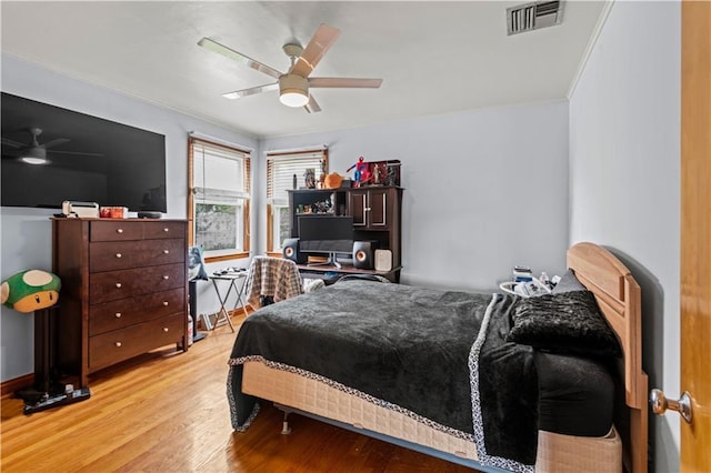 800 Marguerite Rd, Metairie, LA 70003 - bedroom featuring wood finished floors, ceiling fan, and ornamental molding