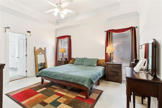 2424 Cours Carson St, Mandeville, LA 70448 - bedroom featuring crown molding, a tray ceiling, ceiling fan, and ensuite bathroom