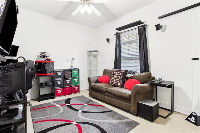 2424 Cours Carson St, Mandeville, LA 70448 - living room with a ceiling fan, carpet flooring, and baseboards