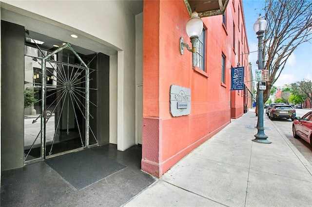 330 Julia St Unit 223, New Orleans, LA 70130 - property entrance with stucco siding