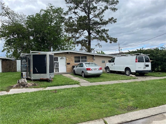 2007 Georgia Ave, Kenner, LA 70062 - view of front of home with a front yard