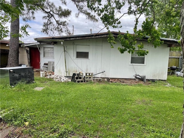 2007 Georgia Ave, Kenner, LA 70062 - view of home's exterior featuring fence and a lawn